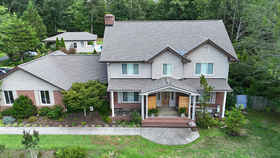 asphalt shingle roof installation and repair by Village Roofs